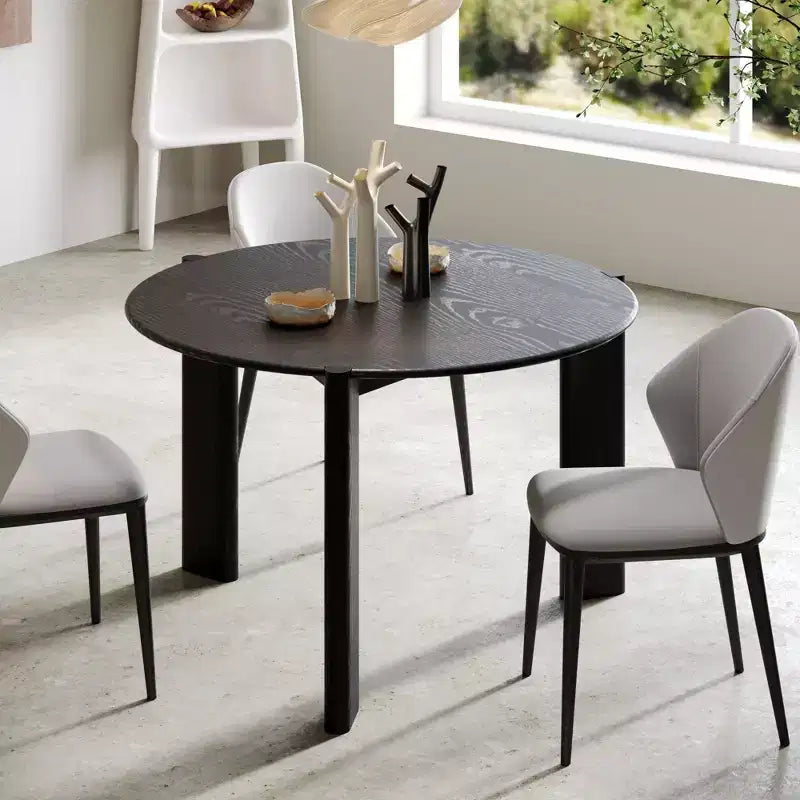 Table de salle à manger de ferme en bois massif avec plateau rond en bois texturé et piètement en X pour salles à manger modernes et réunions de famille