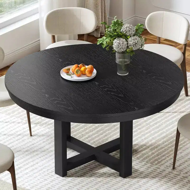 Table de salle à manger de ferme en bois massif avec plateau rond en bois texturé et piètement en X pour salles à manger modernes et réunions de famille