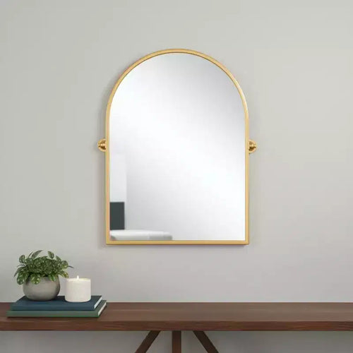 Miroir d'appoint à cadre arqué en métal doré basculant de 36 po